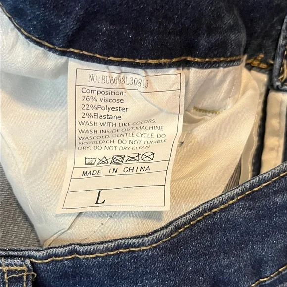 Dark Blue Ripped Flare Jeans with Layered Frayed Panels - Picture 2 of 3